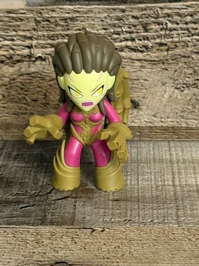 Funko Pink and Olive Green Female Action Figure